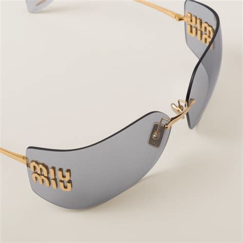 Lunettes De Soleil Miu Regard Verres Gris Clair 